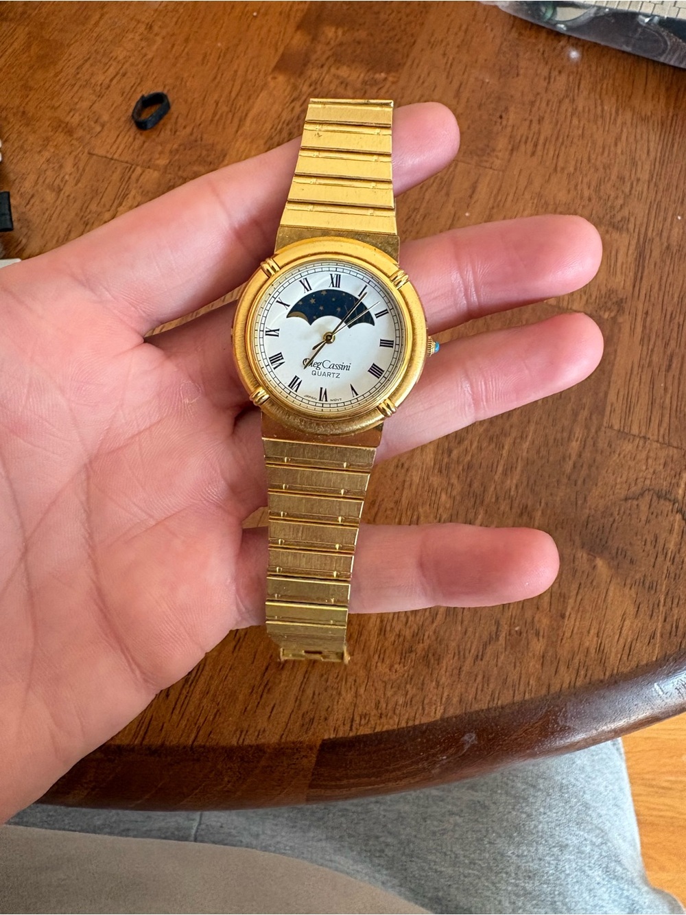 Oleg Cassini moon phase quartz wristwatch